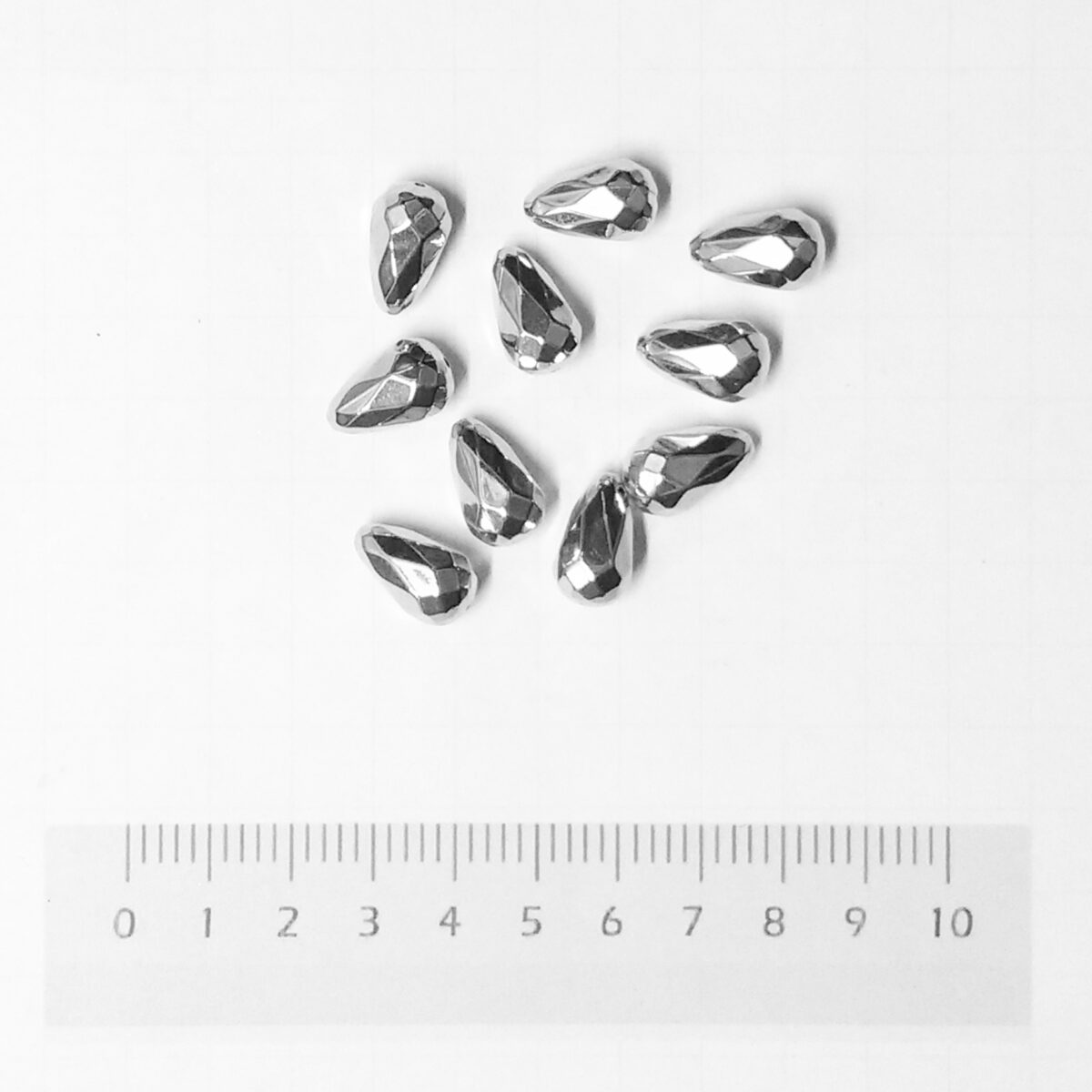 Gota facetada pasante metalizada x10grs