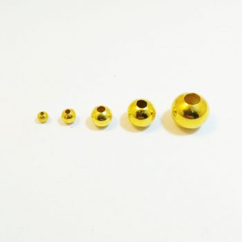 Bolitas de metal doradas