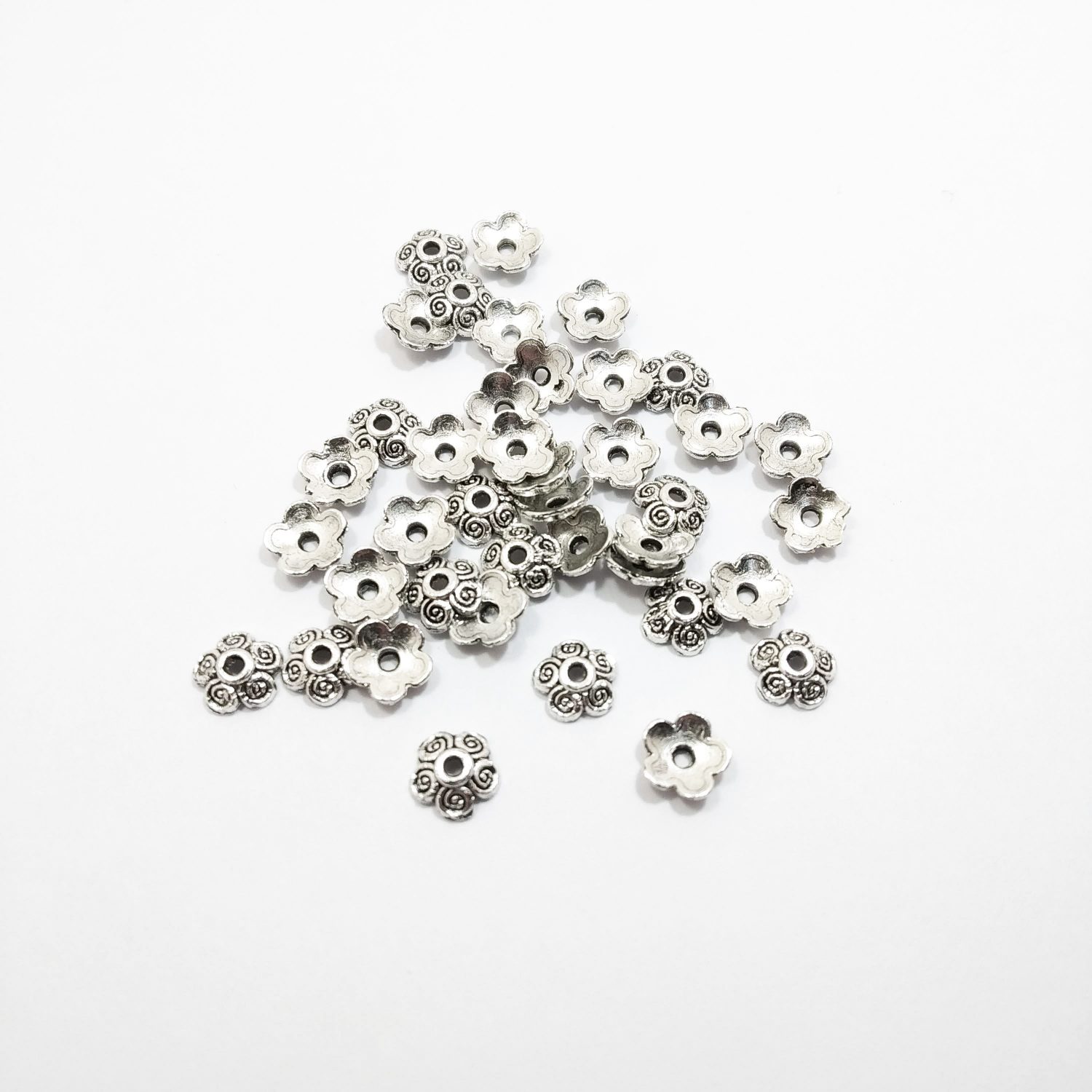 Calota fundicion niquel flor 6 mm