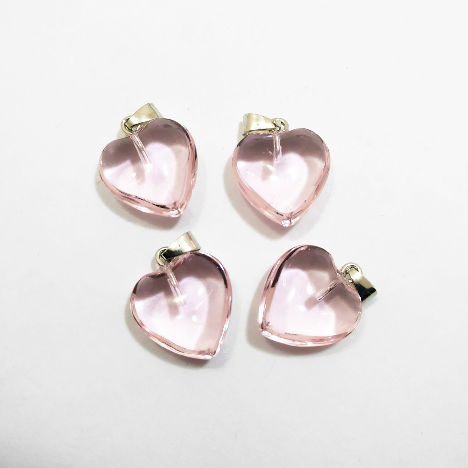 Dije corazon cristal liso rosa chico