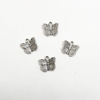Dije metal mariposa niquel x10u