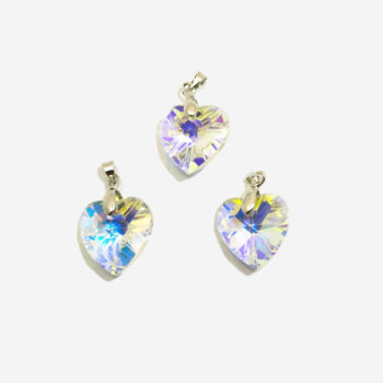 Dije de cristal corazon facetado tornasol transparente chico