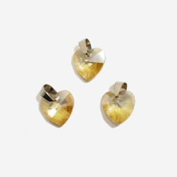 Dije de cristal corazon facetado beige