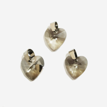 Dije de cristal corazon facetado gris