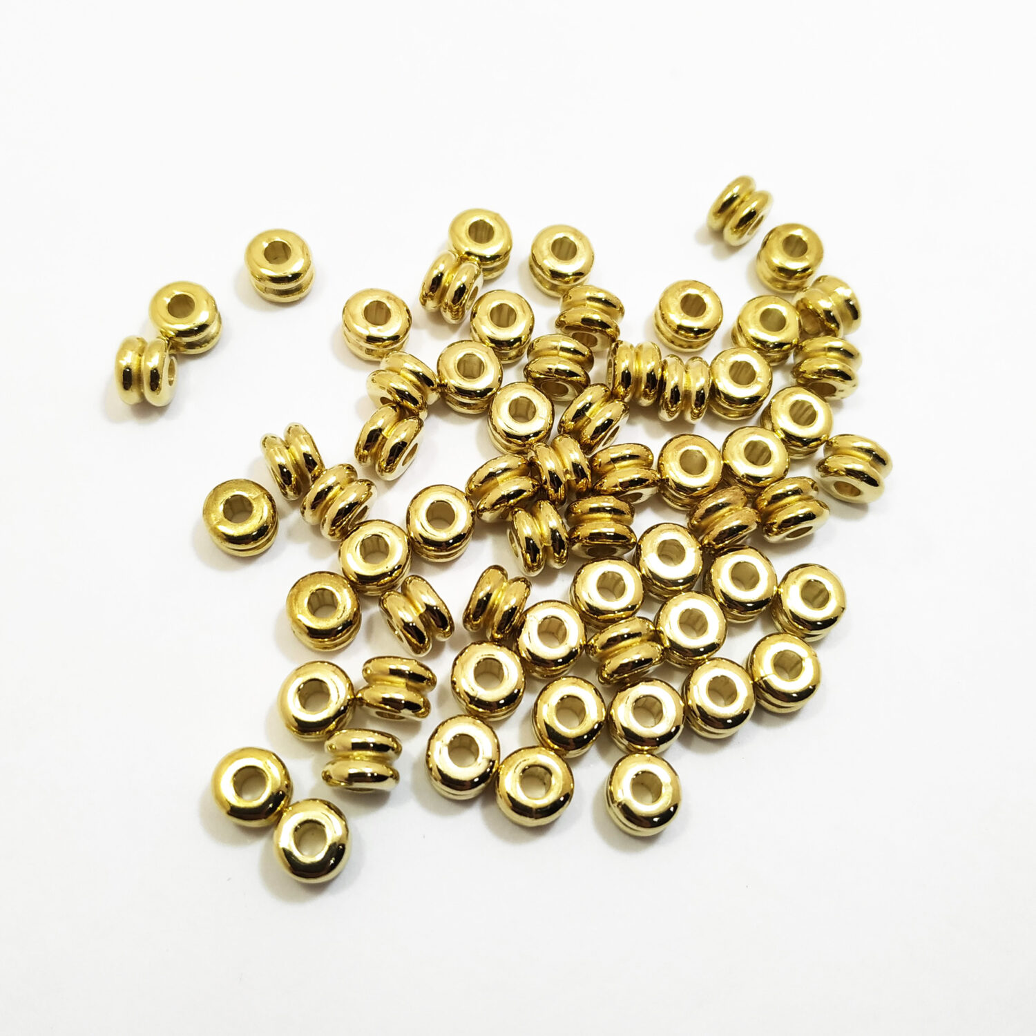 Separador plastico metalizado dorado tubo doble x10 grs