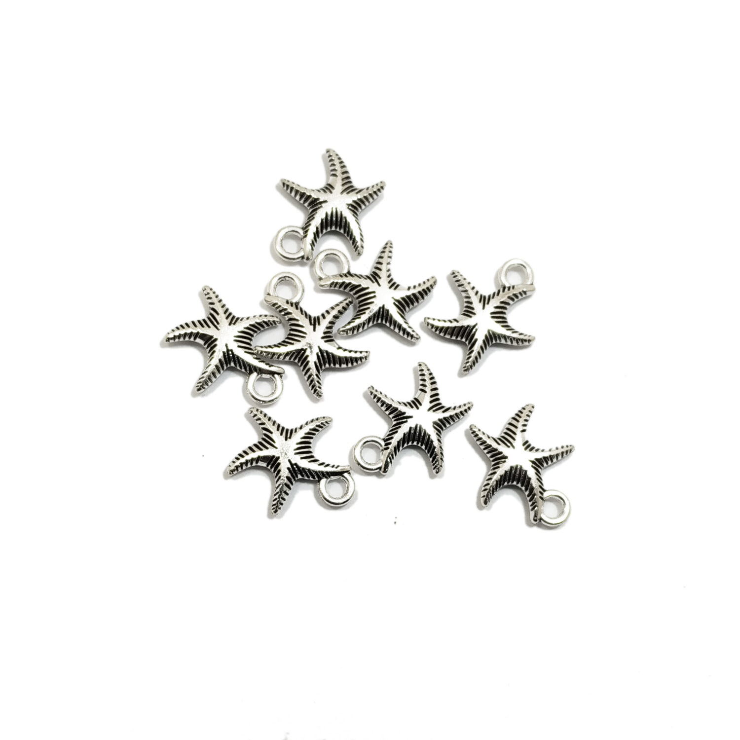 Dije metal estrella de mar rayada x10u