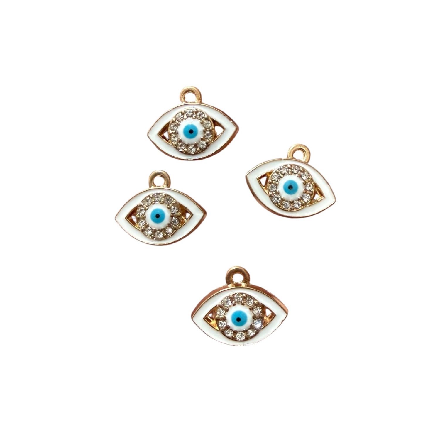 Dije ojo metal con strass dorado esmaltado blanco