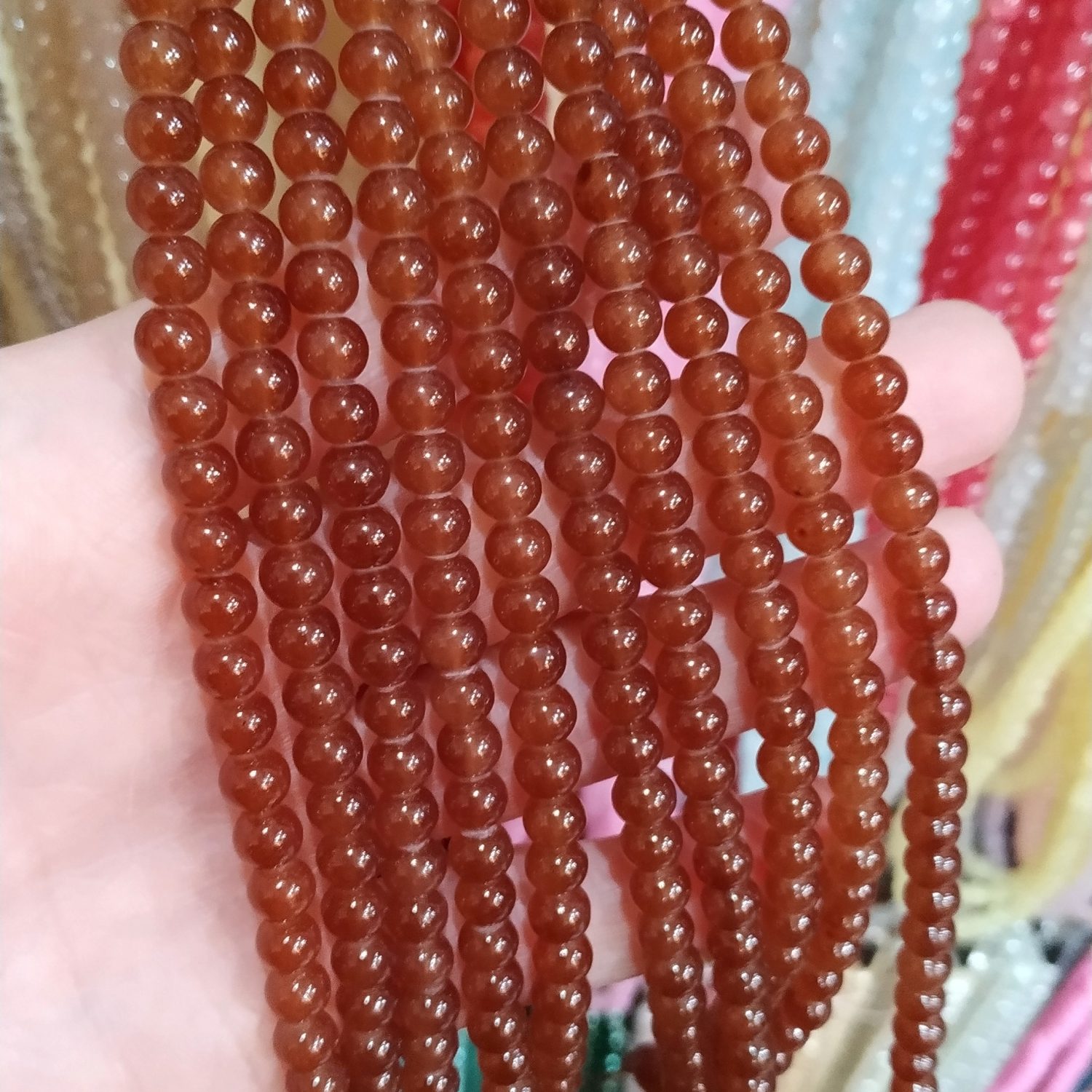 Tira bolitas de vidrio 6 mm marron opalino